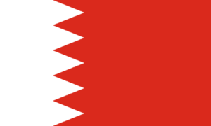 Bandera de Baréin: Rojo con una franja blanca de cinco triángulos que forman un diseño en zigzag en el lado izquierdo.