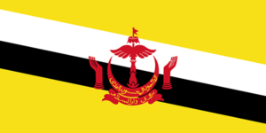 Bandera de Brunéi: Amarillo con dos franjas diagonales blancas y negras y el escudo nacional en el centro.