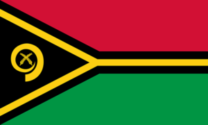 Bandera de Vanuatu: Verde con una franja diagonal roja y negra y un emblema tradicional amarillo.